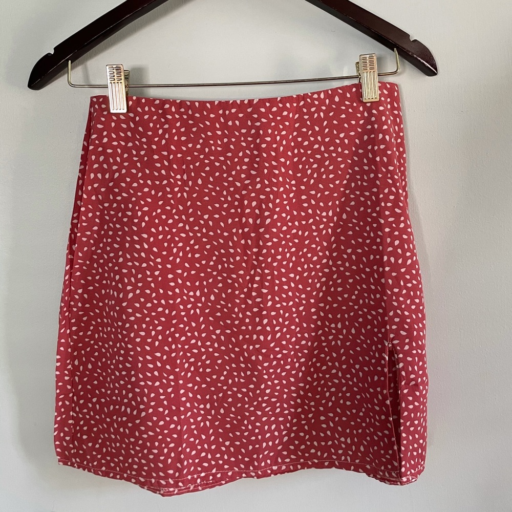 beautifully patterned mini skirt with a small slit